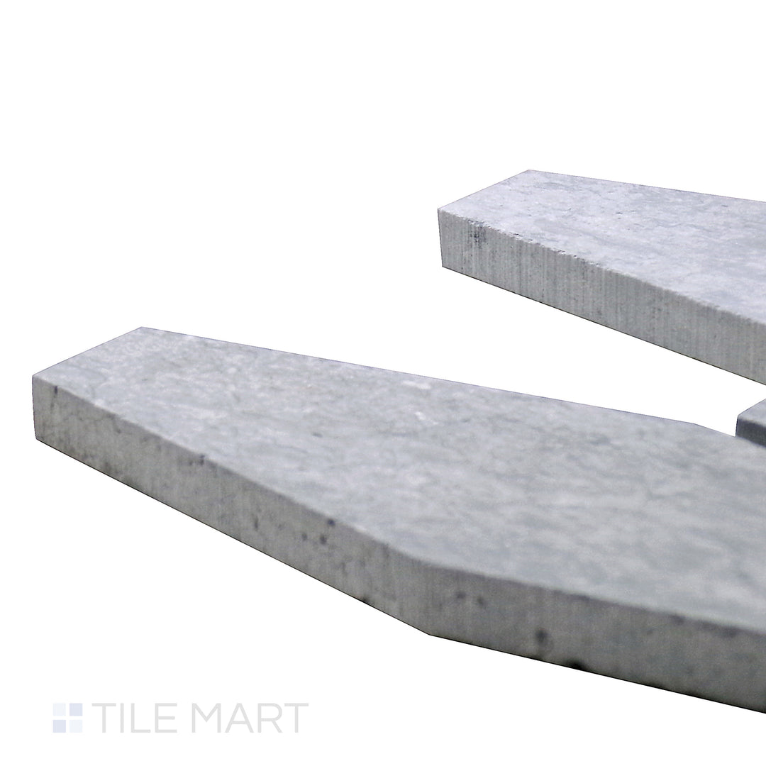 Corner-focused shot of Sto-Re Wooden Blue Elongated Hexagon Polished Marble Mosaic, emphasizing its rich blue-gray hues and elongated geometric pattern.