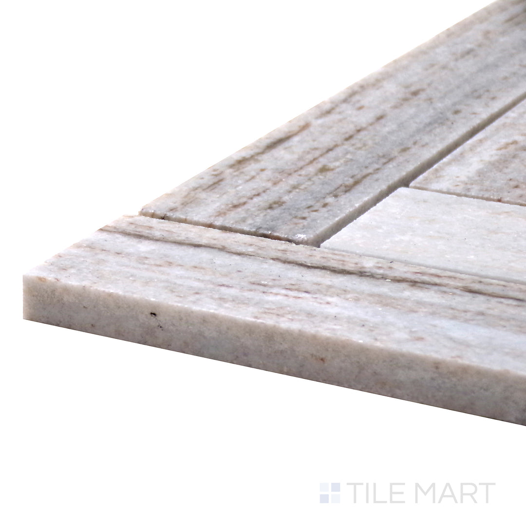 Close-up corner angle of Sto-Re Ocean White Herringbone Polished Marble Mosaic, displaying its crisp white tones with a flowing herringbone pattern.