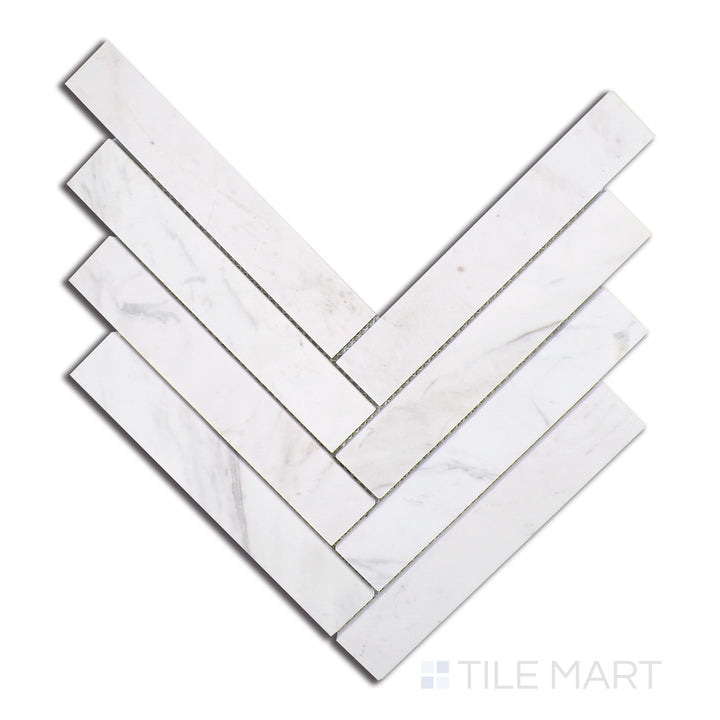 Flat lay of Sto-Re Volakas Herringbone Polished Marble Mosaic, showcasing elegant white and grey Volakas marble with a polished sheen in a classic herringbone pattern.