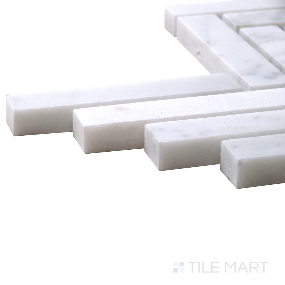Corner shot of Sto-Re Carrara Herringbone Polished Marble Mosaic, featuring crisp white Carrara marble with subtle veining in a refined herringbone pattern.