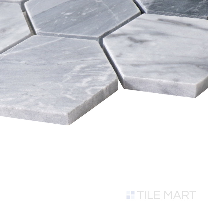 Angled view of Sto-Re Bardiglio 2-1/2" Hexagon polished marble mosaic, featuring its bold gray shades, large-format hexagonal tiles, and sleek polished texture.  