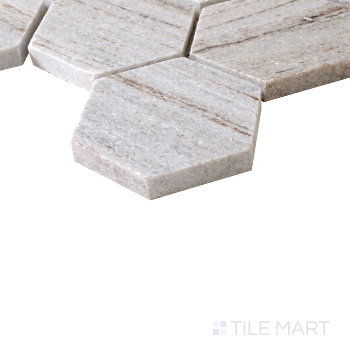 Slanted perspective of Sto-Re Ocean White 2-1/2" Hexagon polished marble mosaic, highlighting its clean white finish, smooth surface, and oversized hexagonal layout.  