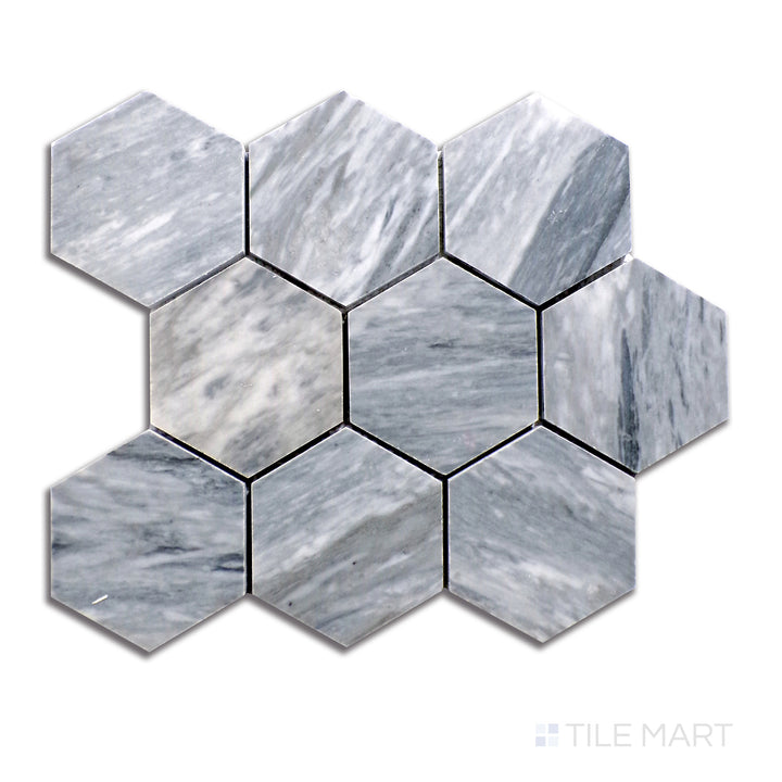 A sleek bird’s-eye image of Bardiglio marble mosaics arranged in an expansive 4-inch hexagon design, featuring bold gray shading with natural tonal shifts and a smooth sheen.