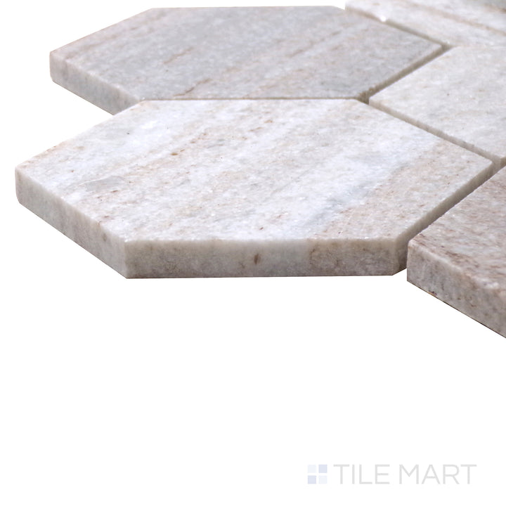 Close-up corner shot of Sto-Re Ocean White 4" Hexagon Polished Marble Mosaic, highlighting its clean white marble with a glossy hexagonal layout.