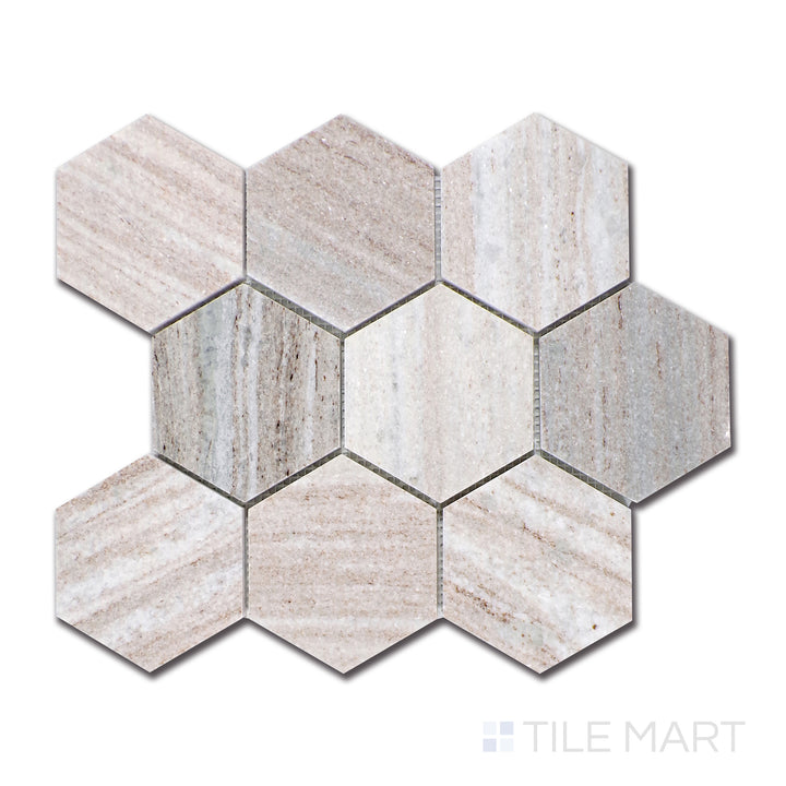 A detailed top-view of Ocean White marble tiles forming a modern 4-inch hexagonal grid, exuding a serene blend of frosty whites and soft misty grays with a glossy coating.