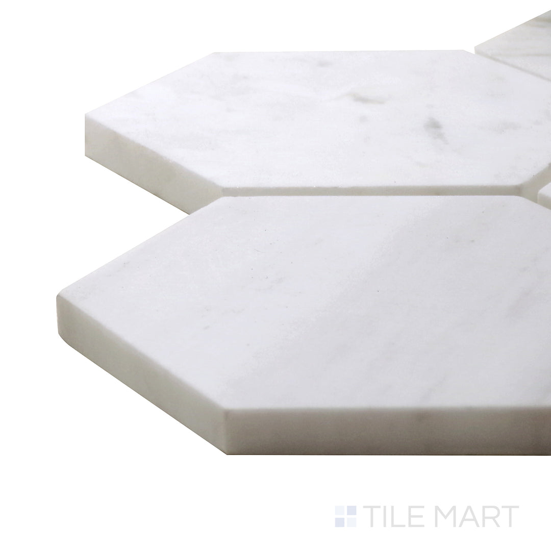 Side perspective of Sto-Re Volakas 4" Hexagon Polished Marble Mosaic, showcasing its natural gray veining in a polished hexagonal format.