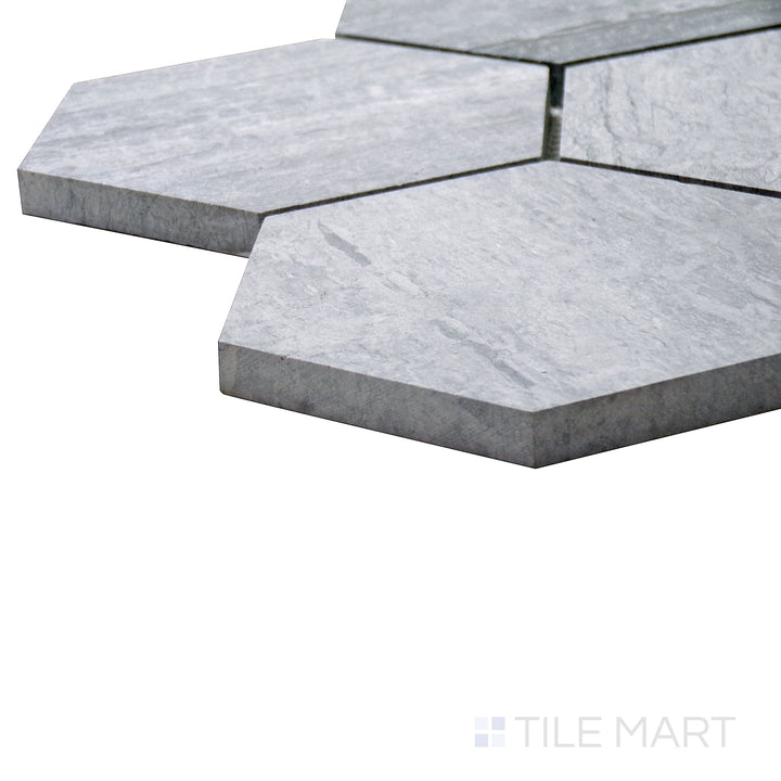 Corner-focused view of Sto-Re Wooden Blue 4" Hexagon Polished Marble Mosaic, featuring its unique blue-gray marble with a glossy, geometric layout.