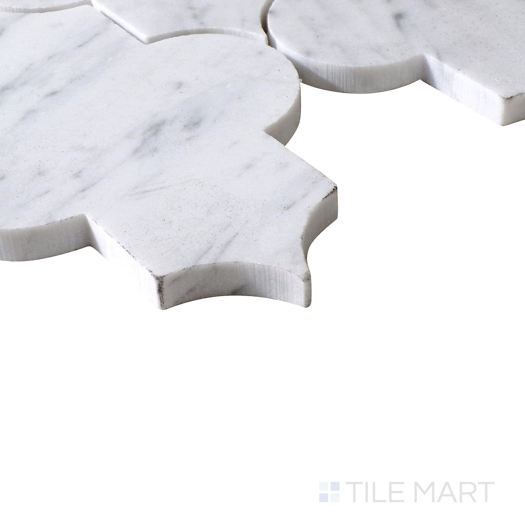 Slanted perspective of Sto-Re Carrara Marrakech Pattern polished marble mosaic, featuring soft white marble with elegant gray veining in a detailed Marrakech pattern.  