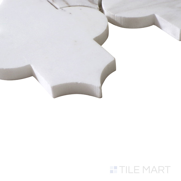 Angled perspective of Sto-Re Volakas Marrakech Pattern polished marble mosaic, emphasizing its refined veining, high-gloss finish, and culturally inspired layout.  