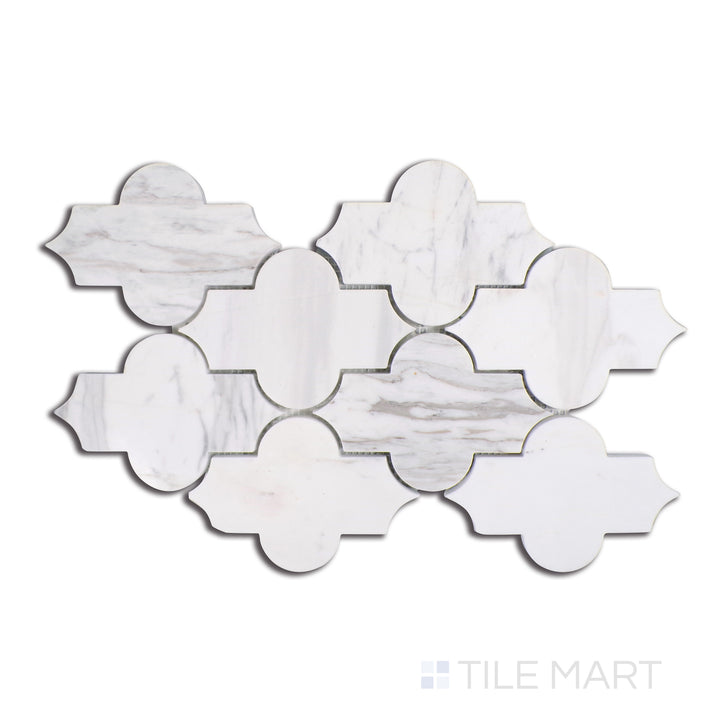 An aerial shot capturing the elegance of Volakas marble in a Marrakech geometric pattern, harmonizing soft white backgrounds with fluid gray veining for a timeless, glossy finish.