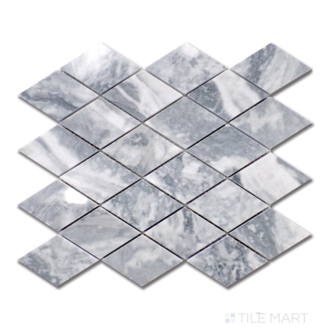 A sleek top-down display of Bardiglio marble cut into a sophisticated rhomboid formation, featuring rich gray shades with natural tonal shifts, polished for a striking effect.