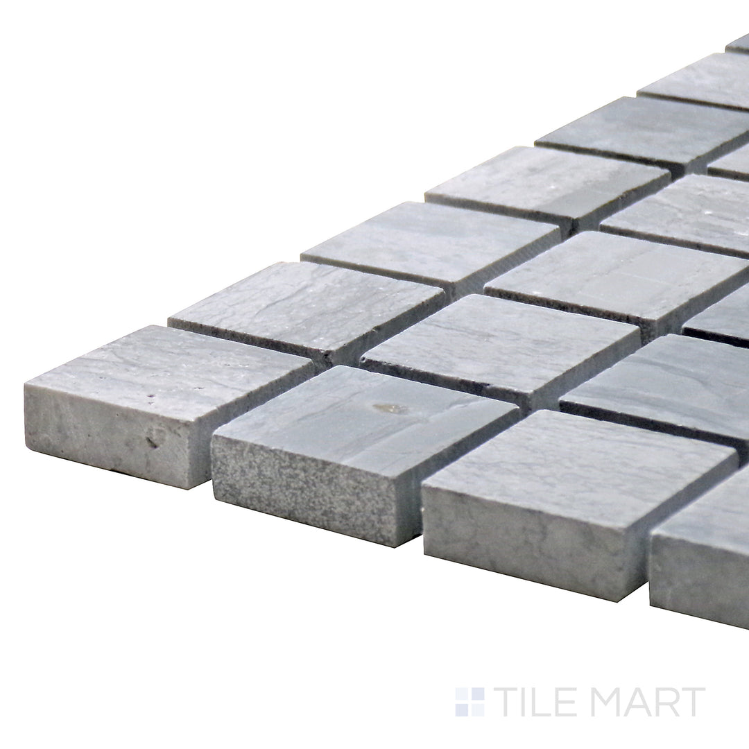 Close-up of Sto-Re Wooden Blue 1-1/8" Square Polished Marble Mosaic, featuring cool blue-gray hues in a refined, structured square format.