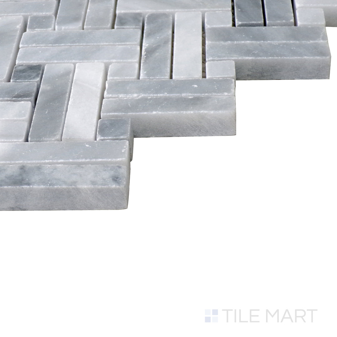 Angled shot of Sto-Re Bardiglio with Bardiglio Dot Stanza polished marble mosaic, highlighting its deep gray hues, small dot accents, and smooth polished finish.  