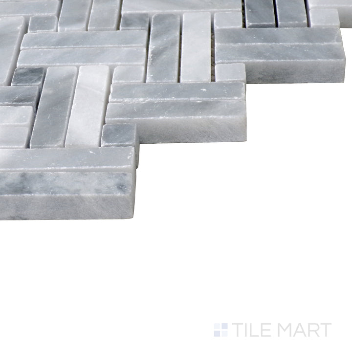 Angled shot of Sto-Re Bardiglio with Bardiglio Dot Stanza polished marble mosaic, highlighting its deep gray hues, small dot accents, and smooth polished finish.  