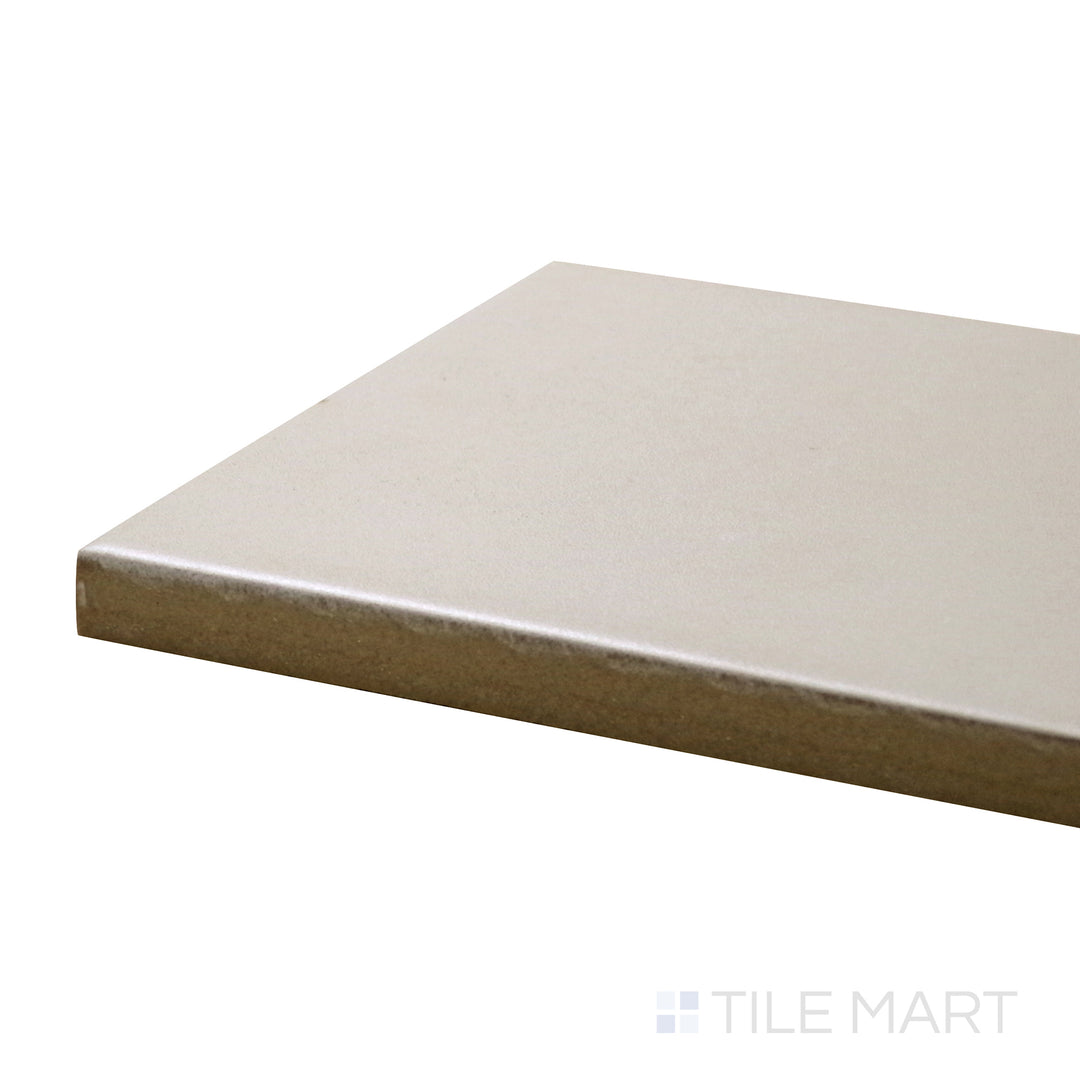 Corner shot of Stromboli Beige Gobi 3.5X14.5 Matte Porcelain Tile, showcasing its warm beige tones and subtle stone-like texture in a sleek matte finish.