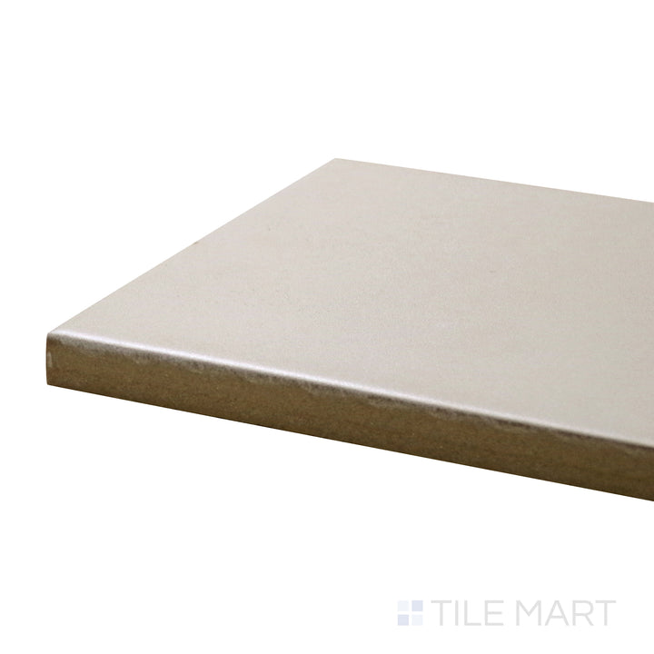 Corner shot of Stromboli Beige Gobi 3.5X14.5 Matte Porcelain Tile, showcasing its warm beige tones and subtle stone-like texture in a sleek matte finish.