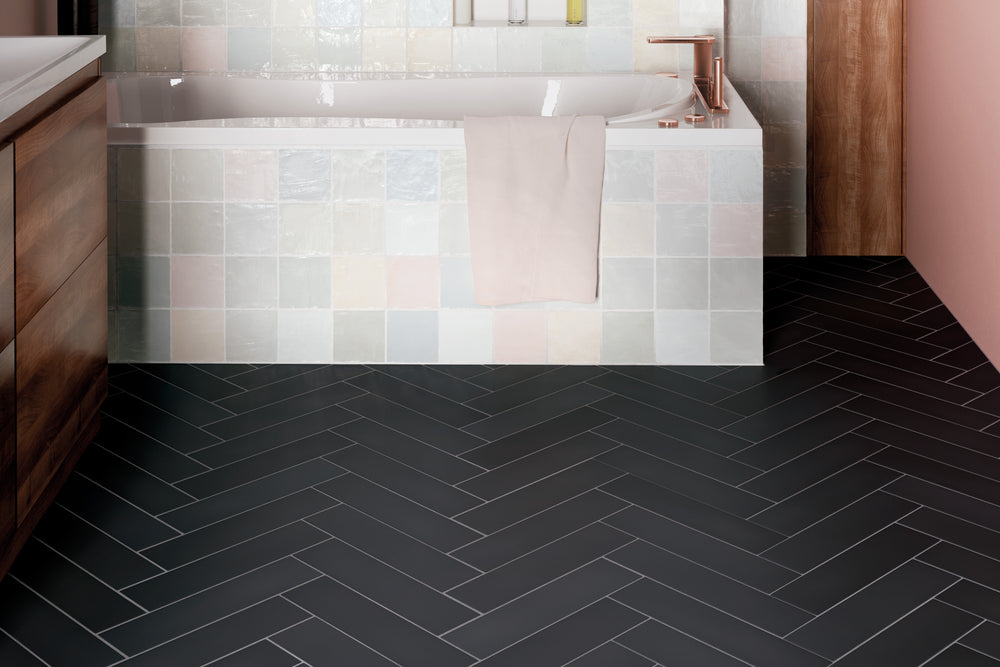 A bold and dramatic setting with Stromboli Black City 3.5X14.5 Matte Porcelain, exuding modern elegance with a deep, rich finish.