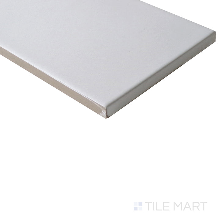 Angled view of Stromboli White Plume 3.5x14.5 matte porcelain tile, showcasing its crisp white tones, smooth surface, and elegant matte finish.  