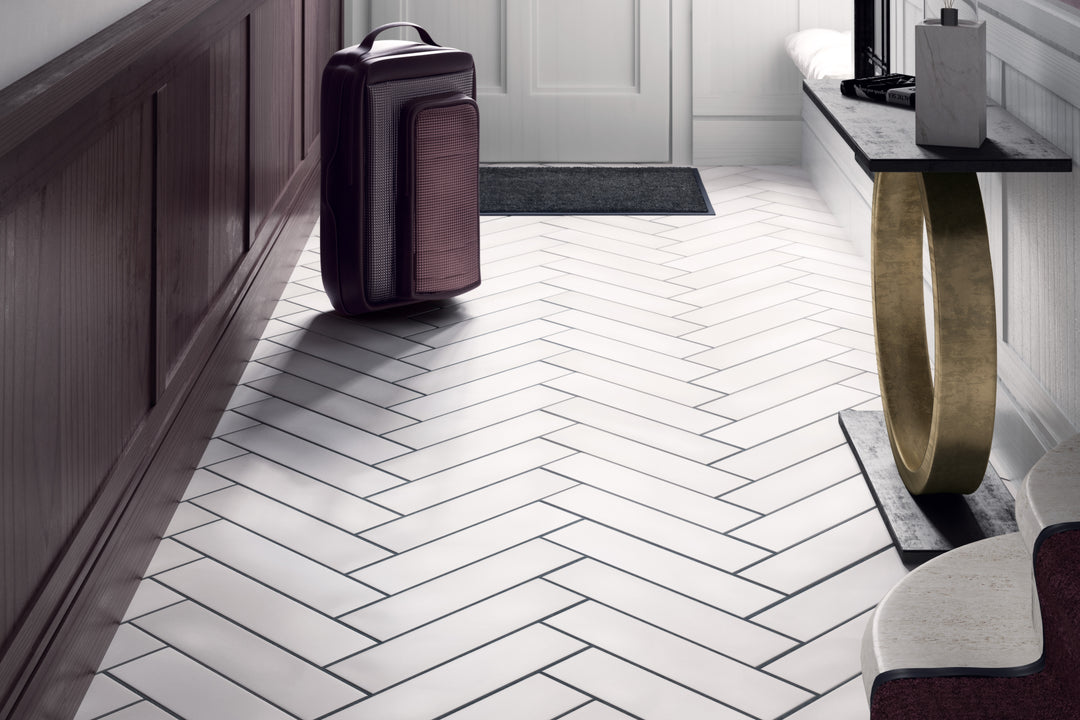 A crisp and airy atmosphere featuring Stromboli White Plume 3.5X14.5 Matte Porcelain, bringing a bright and clean aesthetic.