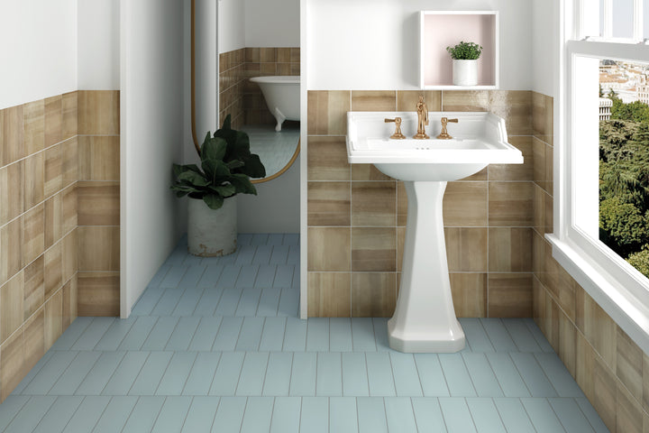 A vibrant and refreshing ambiance enhanced by Stromboli Bahia Blue 3.5X14.5 Matte Porcelain, adding a bold splash of color.