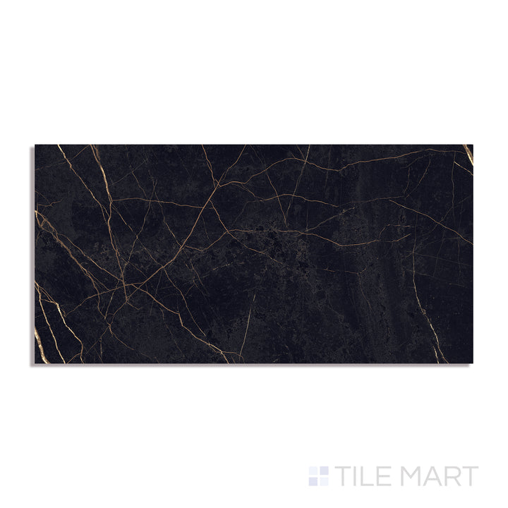 Top-down view of Supreme Evo Noir Laurent 24x48 polished porcelain tile, boasting deep black tones accented by dramatic golden veining.