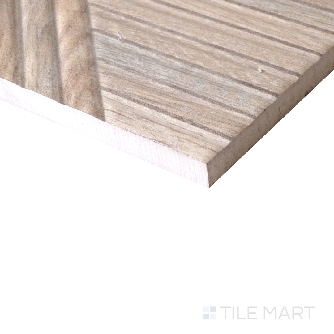 Angled shot of Tangram Camel 12.2x39.37 matte ceramic tile, showcasing its warm camel tones, sleek rectangular format, and smooth matte finish.  