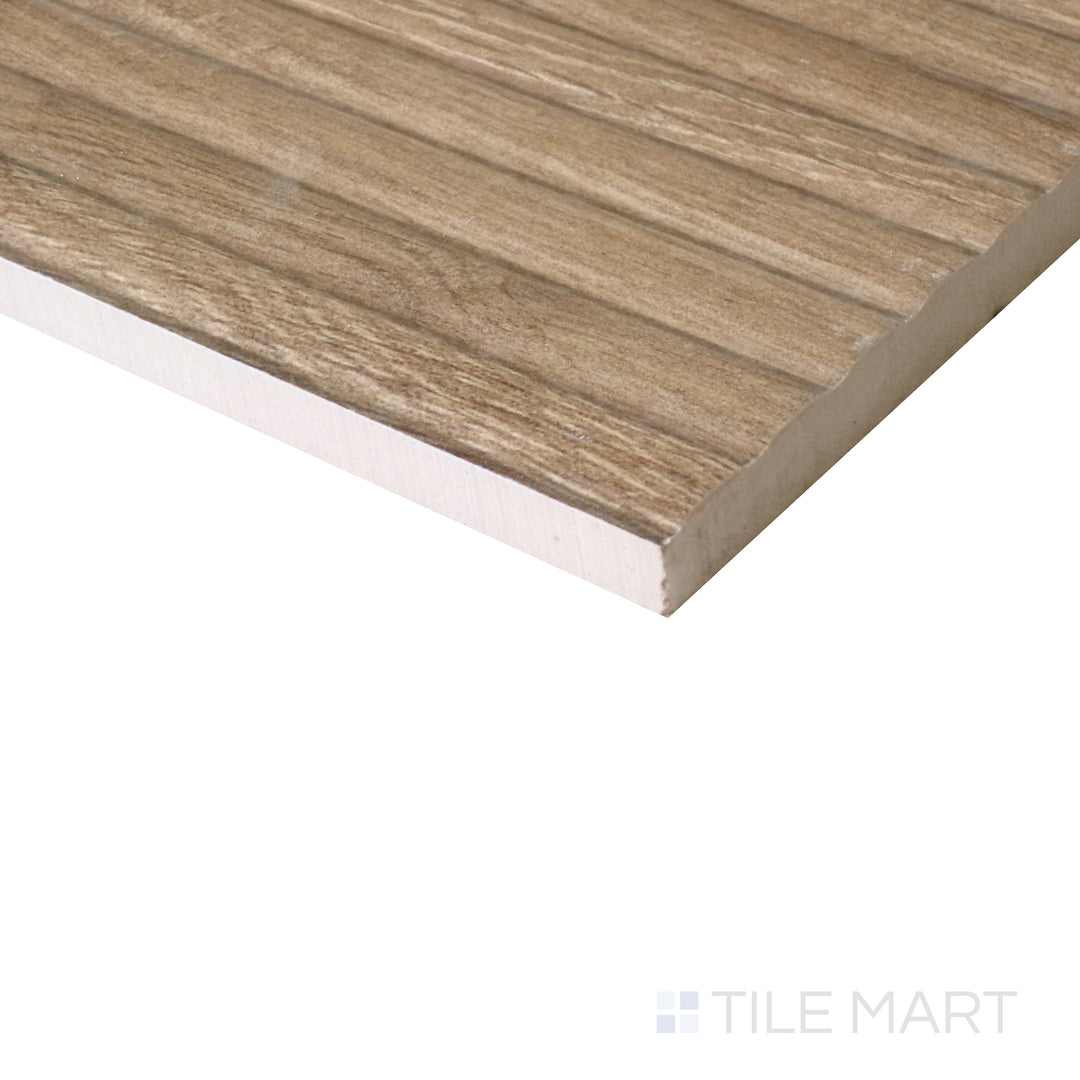 Diagonal view of Tangram Walnut 12.2x39.37 matte ceramic tile, highlighting its rich walnut hues, elongated design, and modern matte surface.  