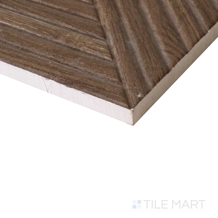 Slanted perspective of Tangram Coffee 12.2x39.37 matte ceramic tile, featuring deep coffee brown tones, a refined matte finish, and an elongated rectangular shape.  