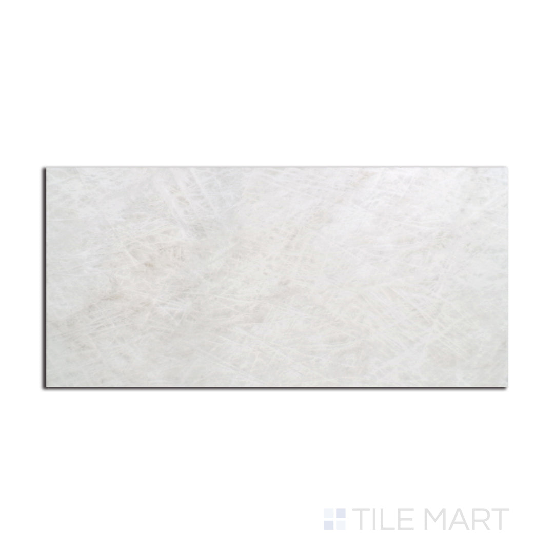 Overhead shot of Tele Di Marmo Reloaded Quarzo 12X24 matte porcelain tile, showcasing a refined quartz-inspired surface with soft neutral tones.