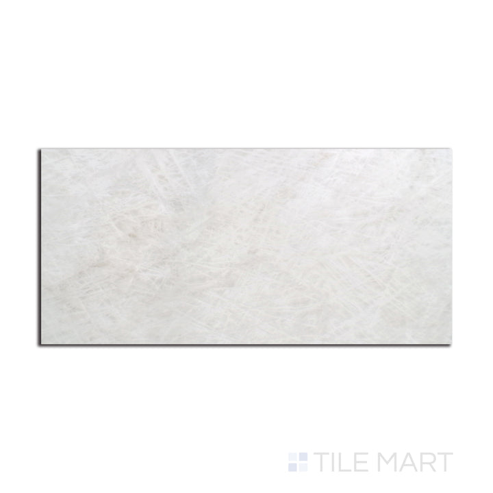 Overhead shot of Tele Di Marmo Reloaded Quarzo 12X24 matte porcelain tile, showcasing a refined quartz-inspired surface with soft neutral tones.