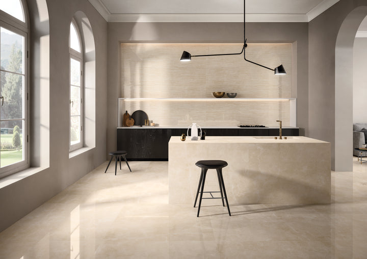A warm and sophisticated setting highlighted by Tele Di Marmo Reloaded Marfil 24X48 Matte Porcelain, exuding elegance with its creamy beige tones and subtle veining.