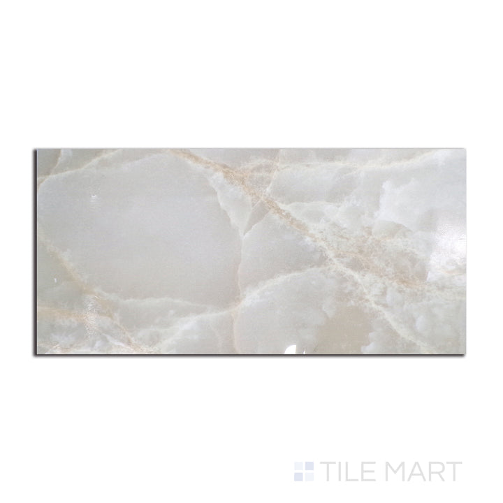 Overhead shot of Tele Di Marmo Reloaded Onice Klmt 24X48 matte porcelain tile, displaying a translucent onyx effect with a rich, dramatic texture.