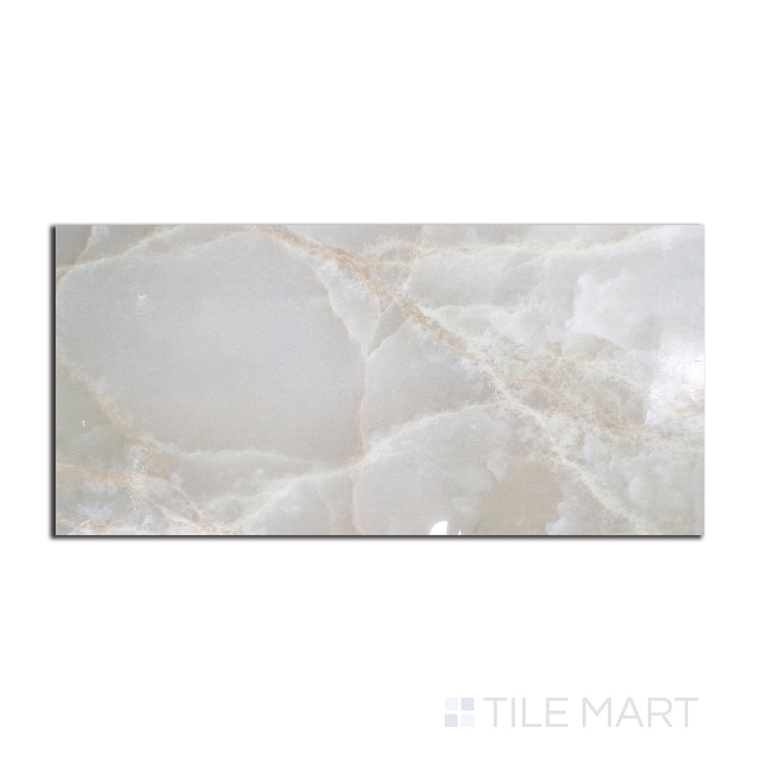 Flat-lay image of Tele Di Marmo Reloaded Onice Klmt 12X24 polished porcelain tile, an elegant, polished surface with a blend of warm and cool undertones.