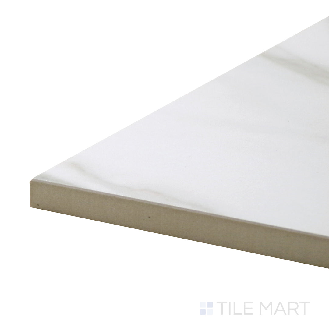 Corner-focused shot of Tele Di Marmo Reloaded Calacatta 24X48 Polished Porcelain Tile, showcasing its elegant white marble base with bold veining in a reflective finish.