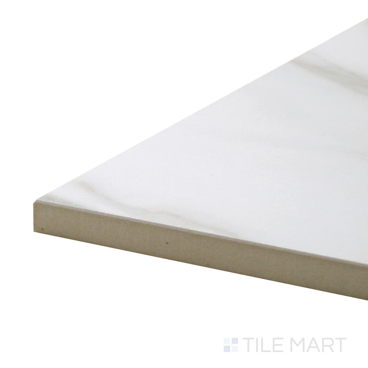 Corner-focused shot of Tele Di Marmo Reloaded Calacatta 24X48 Polished Porcelain Tile, showcasing its elegant white marble base with bold veining in a reflective finish.
