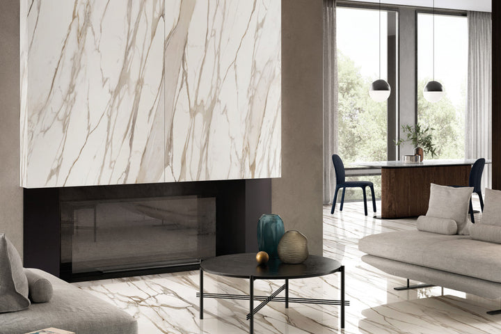 An opulent and radiant environment designed with Tele Di Marmo Reloaded Calacatta 24X48 Polished Porcelain, capturing the essence of luxurious marble with its glossy surface.