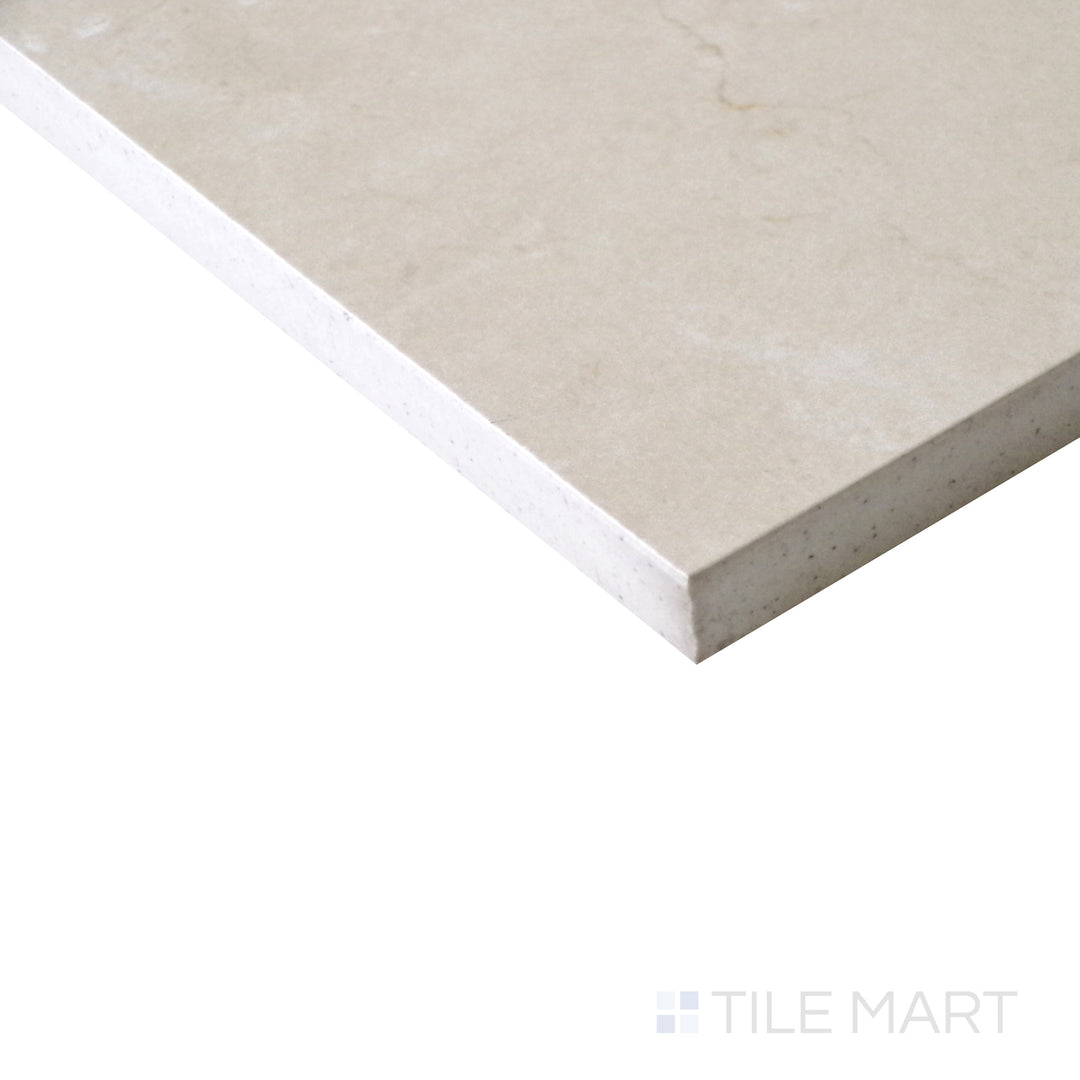 Diagonal shot of Tele Di Marmo Reloaded Marfil 24x48 polished porcelain tile, emphasizing its warm beige hues, expansive format, and smooth high-gloss finish.  