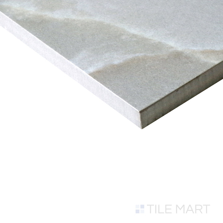 Slanted angle of Tele Di Marmo Reloaded Onice Klmt 24x48 polished porcelain tile, capturing its intricate onyx veining, rich tones, and luxurious polished texture.  