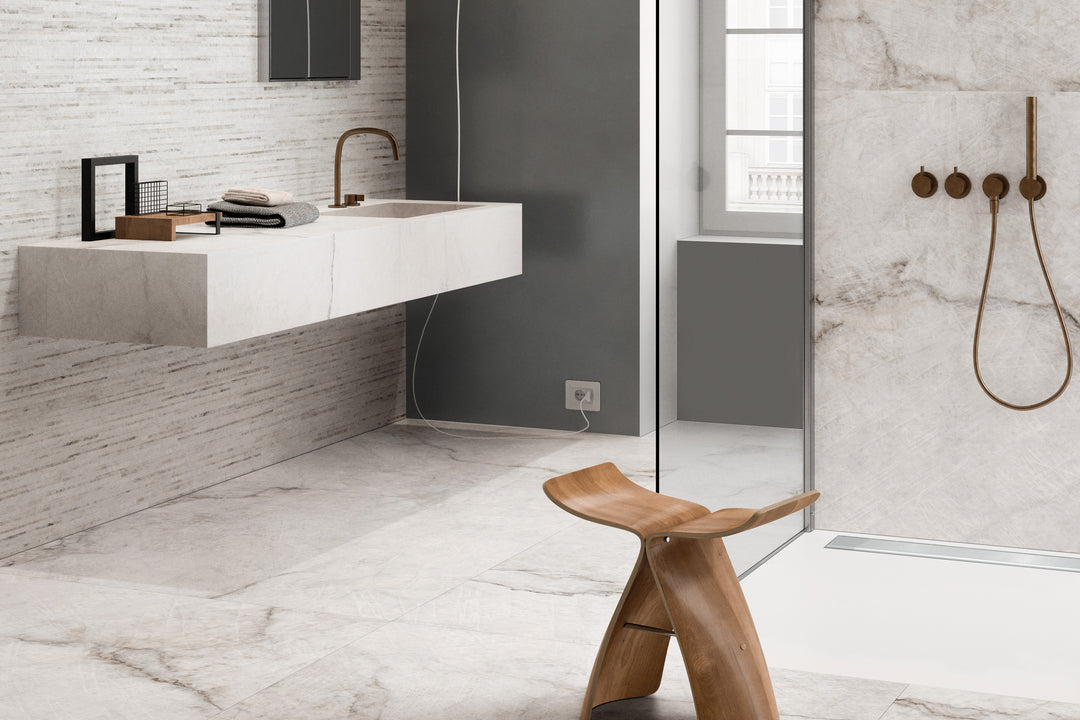A modern and elegant interior complemented by Tele Di Marmo Reloaded Quarzo 24X48 Polished Porcelain, reflecting sophistication with its radiant quartz-inspired patterns.