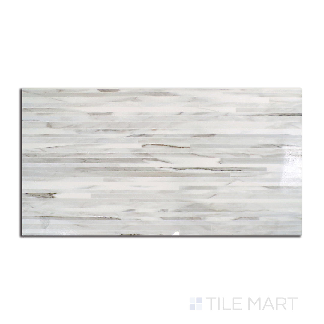 Aerial perspective of Tele Di Marmo Reloaded Calacatta 24X48 polished porcelain tile, bringing a bold marble aesthetic with a sleek sheen.
