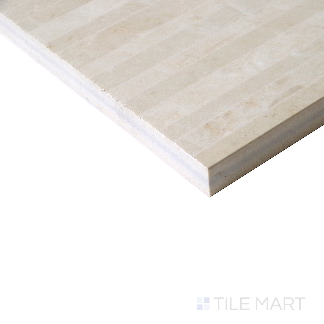 Slanted perspective of Tele Di Marmo Reloaded Marfil 24x48 polished porcelain tile, emphasizing its warm beige color palette, smooth texture, and radiant polished sheen.  
