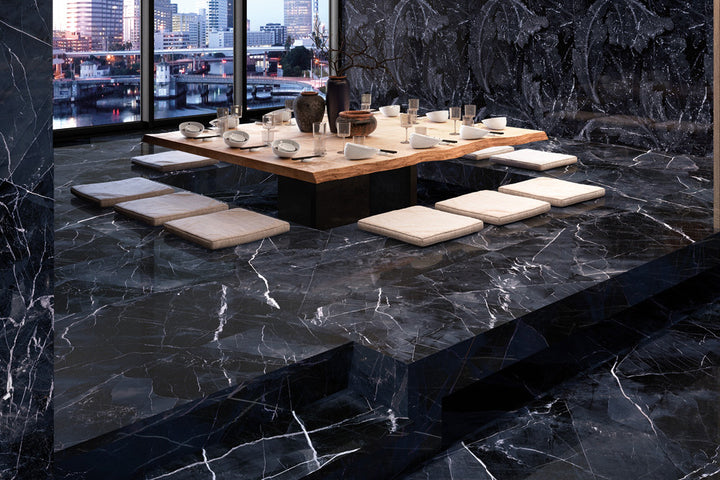 A striking contrast of dark and light tones, Tele Di Marmo Revolution Calacatta Black 24X48 Matte Porcelain creates a bold yet elegant statement with its refined matte finish.