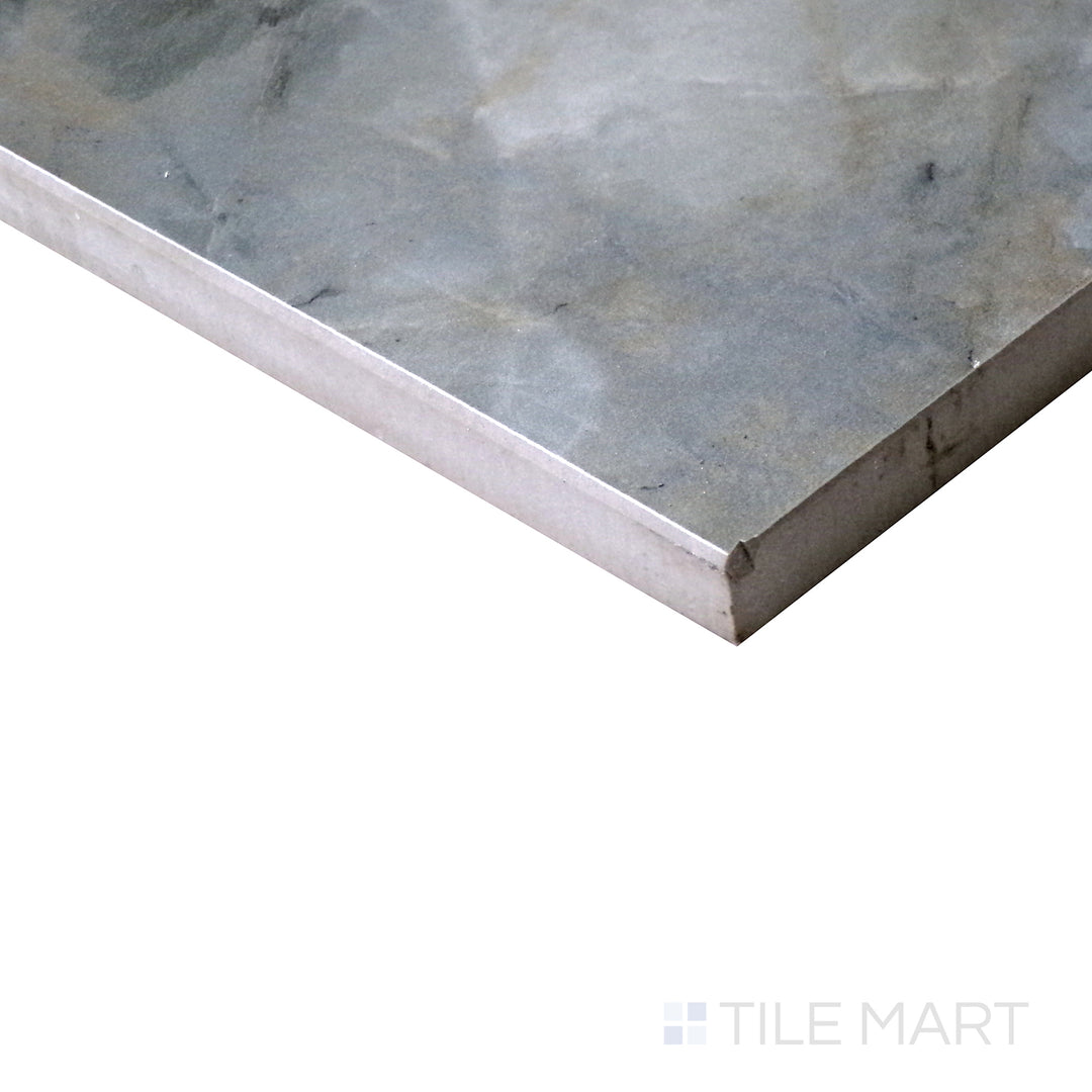 Diagonal view of Tele Di Marmo Revolution Patagonia 24x48 matte porcelain tile, highlighting its dynamic color variations, bold veining, and soft matte texture.  