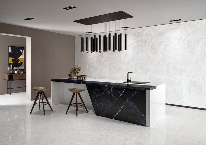 A luminous and pristine aesthetic created with Tele Di Marmo Revolution Thassos 24X48 Polished Porcelain, enhancing spaces with its mirror-like finish.