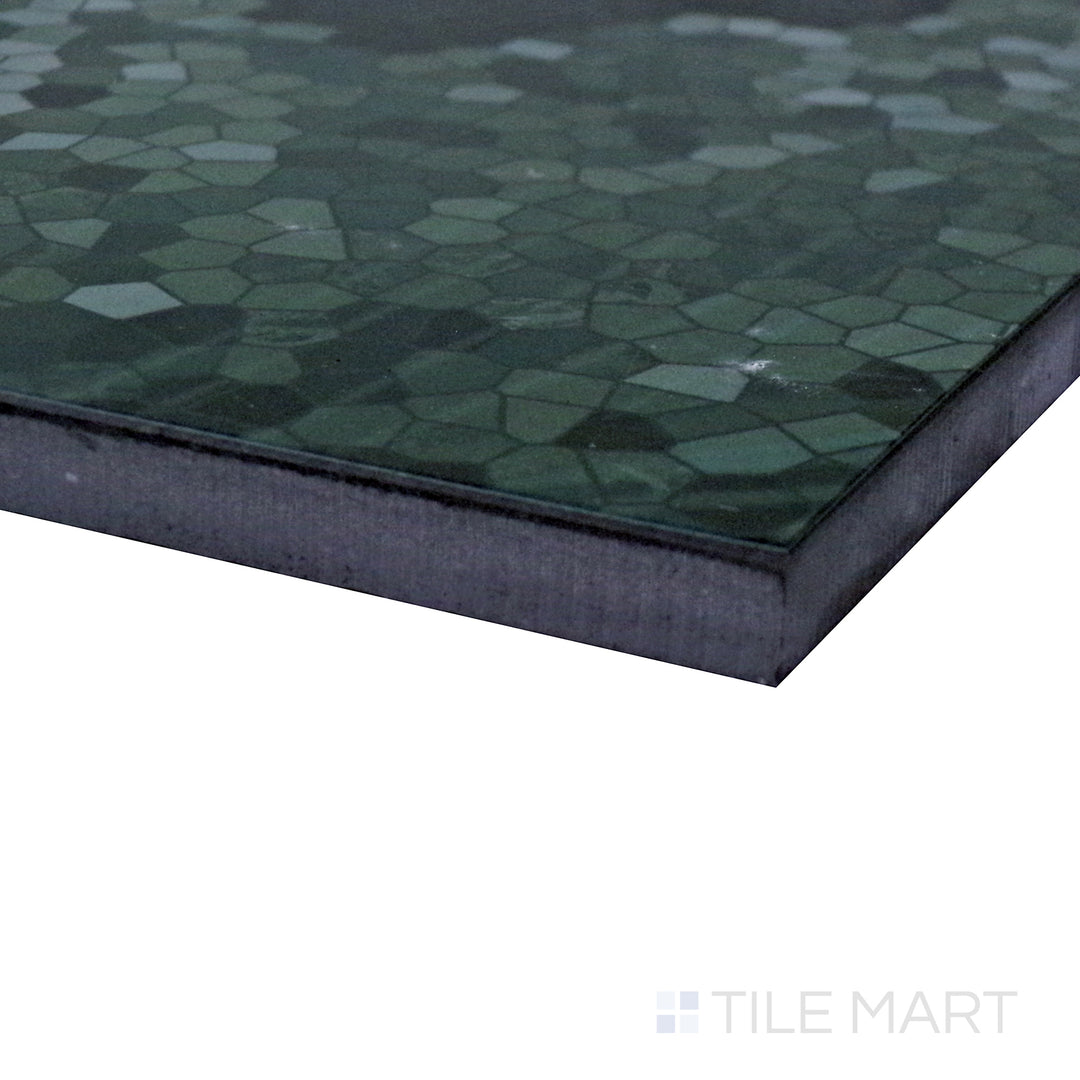 Slanted angle of Tele Di Marmo Revolution Verde St Denis 24x48 polished porcelain tile, showcasing its vibrant green hues, dynamic veining, and sleek polished surface.  