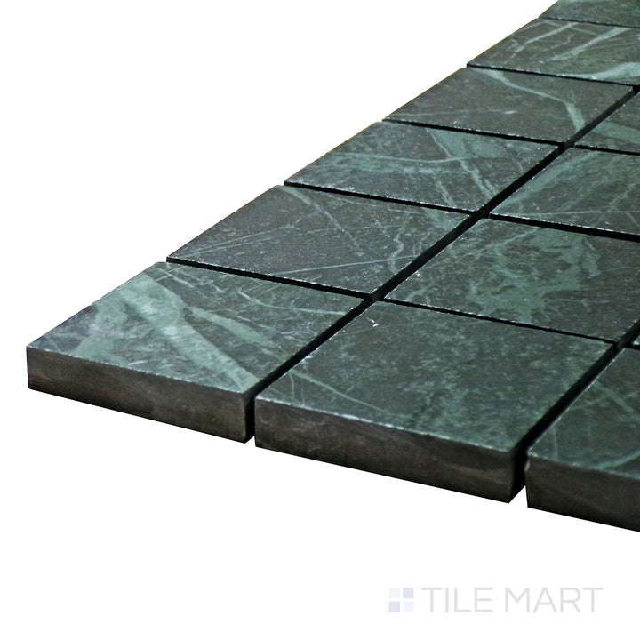 Close-up corner shot of Tele Di Marmo Revolution Verde St Denis 2" Square Matte Porcelain Mosaic, featuring its deep green hues in a precise square mosaic pattern.