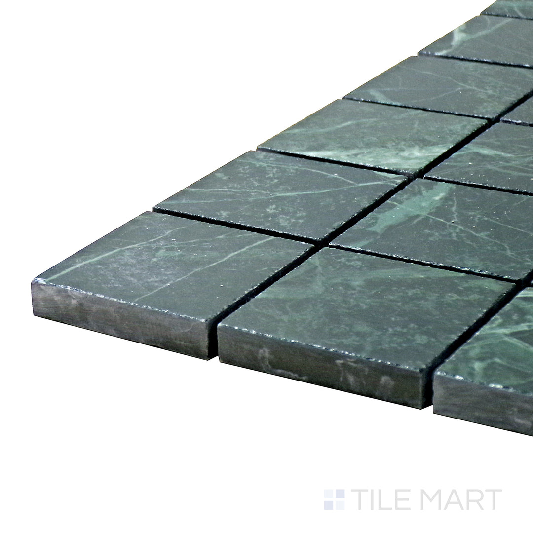 Corner-focused shot of Tele Di Marmo Revolution Verde St Denis 2" Square Polished Porcelain Mosaic, featuring its luxurious deep green marble tones in a polished square mosaic pattern.