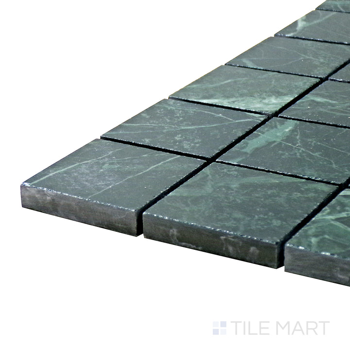 Corner-focused shot of Tele Di Marmo Revolution Verde St Denis 2" Square Polished Porcelain Mosaic, featuring its luxurious deep green marble tones in a polished square mosaic pattern.