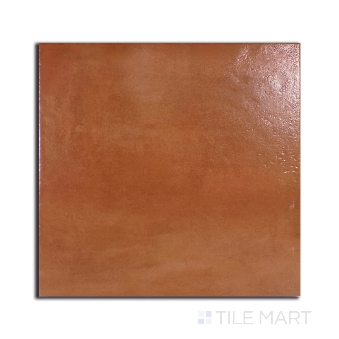 Overhead shot of Terracotta Italian Saltillo Terra Cotta 13X13 polished porcelain, showcasing a rich, earthy tone reminiscent of traditional clay tiles.