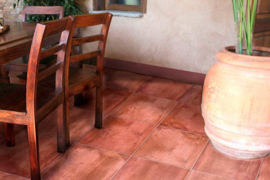 An authentic and traditional setting enhanced by Terracotta Italian Saltillo Terra Cotta 13X13 Polished Porcelain, offering classic clay-inspired hues with a polished surface.